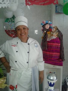 Lidia Morales in Chef uniform